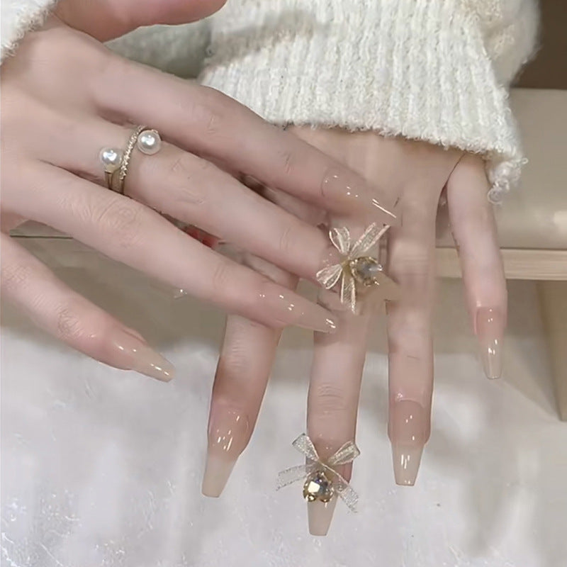 Artificial nail set with elegant 3D patterns and delicate accents Bowlift