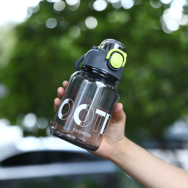 Women's transparent sports water bottle with practical Bowlift attachment