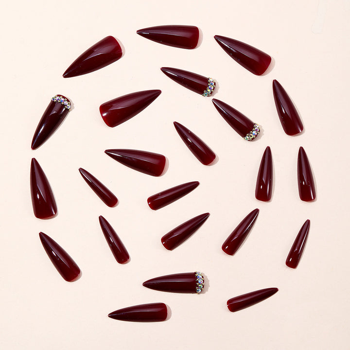 Elegant Stiletto Nail Art Extensions with Glitter Accents Bowlift