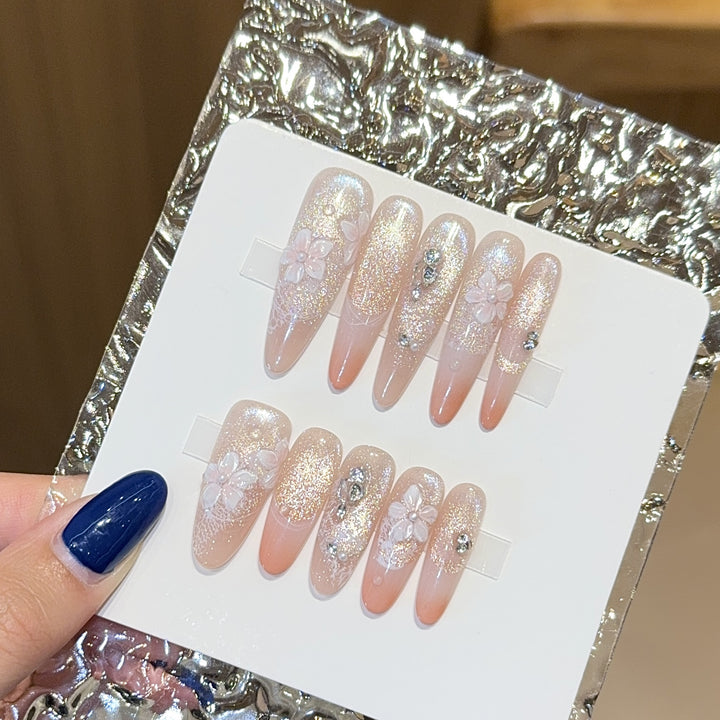 Artificial nails with floral design and glitter Bowlift