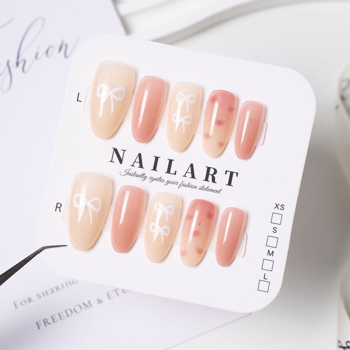 Elegant Stiletto Press-On Nails with Decorative Floral Accents Bowlift