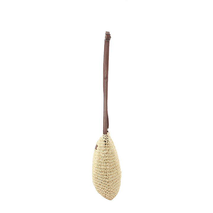 Shoulder bag made of handwoven natural material with adjustable shoulder strap Bowlift
