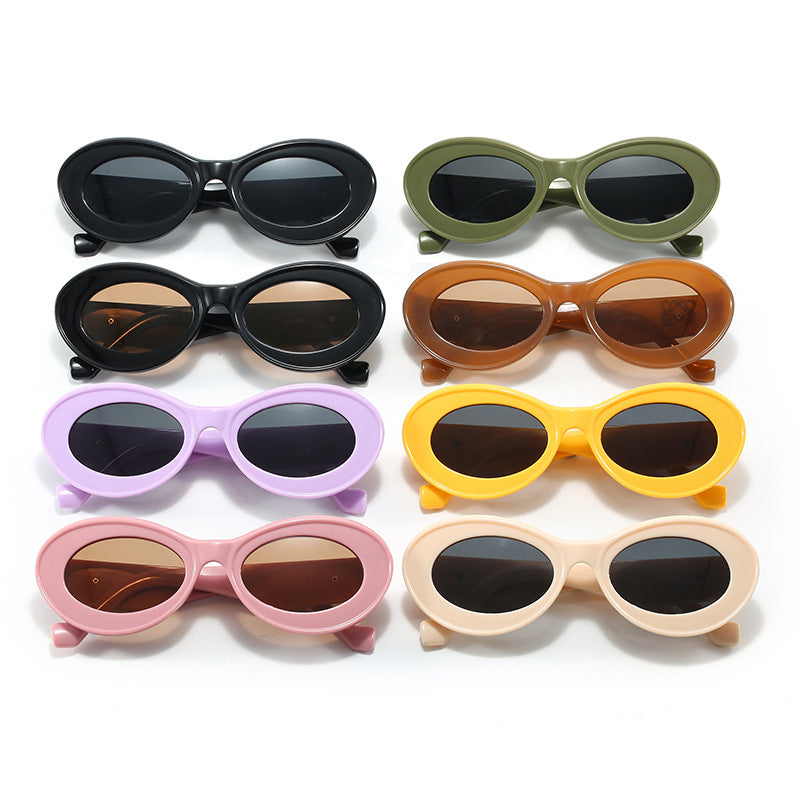Women's fashionable sunglasses with oval frame and golden applications Bowlift