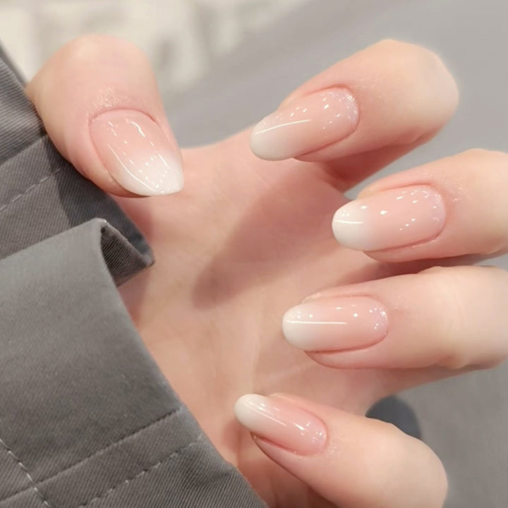 Elegant Gel Nail Extensions in Modern French Tip Design Bowlift