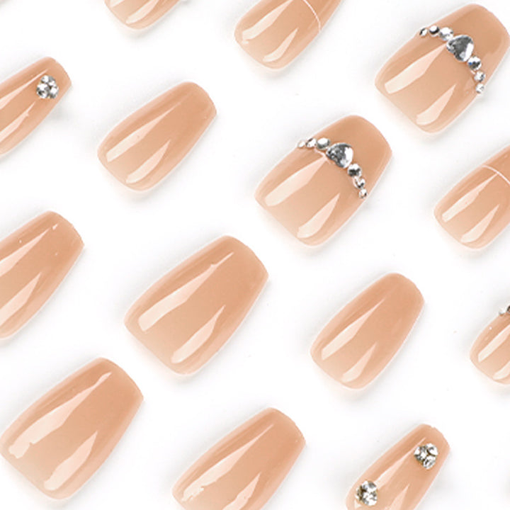 Glamorous nail art with rhinestone embellishment Bowlift