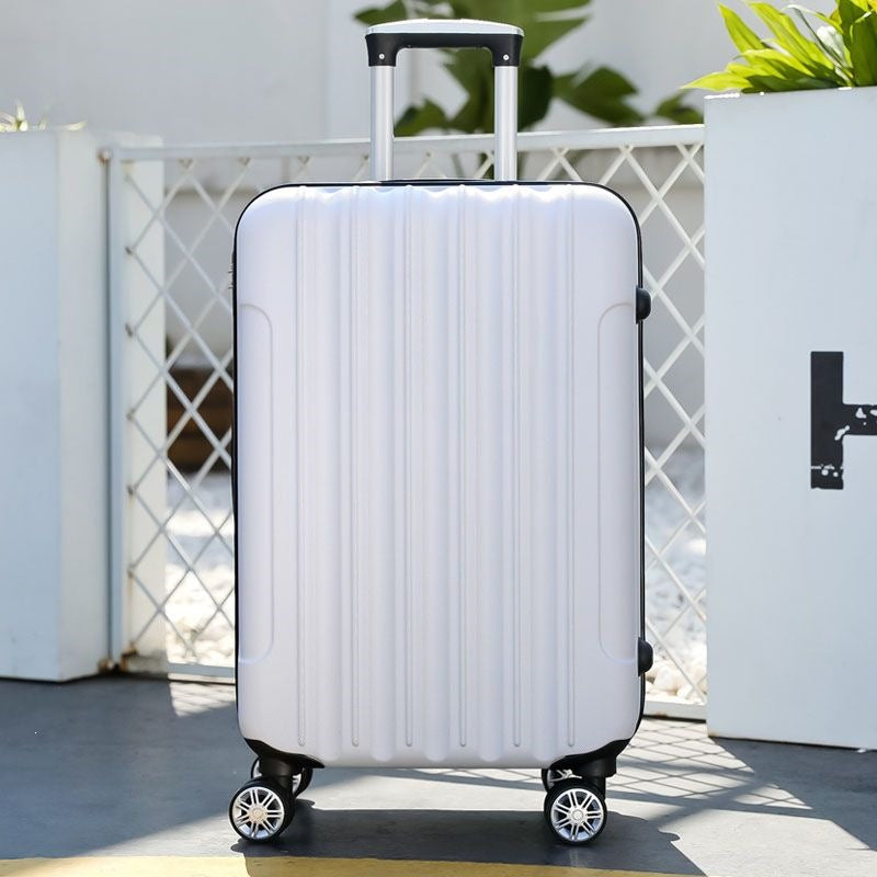 Hard shell suitcase with 360-degree wheel system and integrated safety feature Bowlift