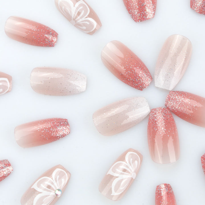 Elegant Ombre Press-On Nail Extensions with Decorative Accents Bowlift