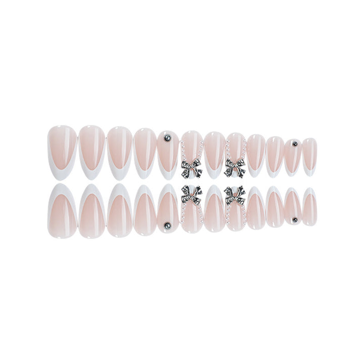 Acrylic nail set with elegant decorative embellishments Bowlift