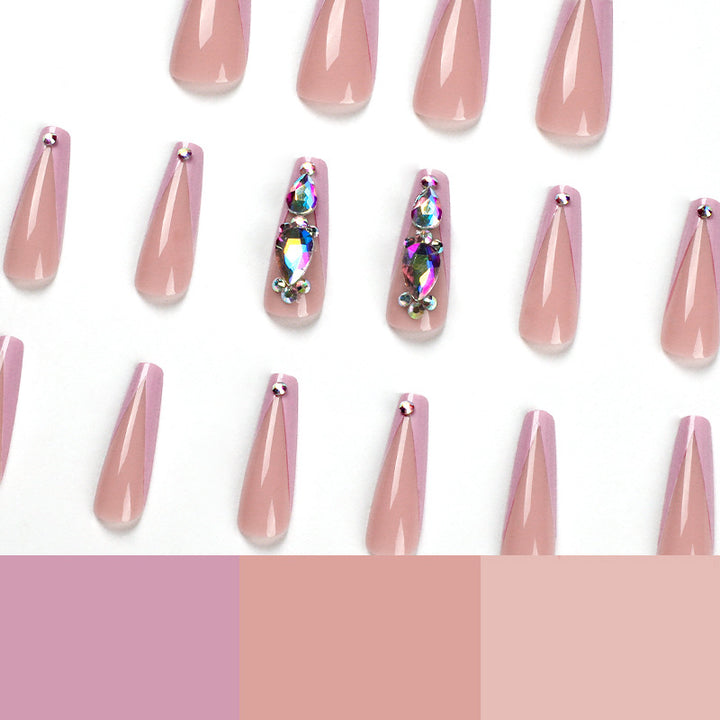 Artful nail extensions with rhinestone and flower accents Bowlift