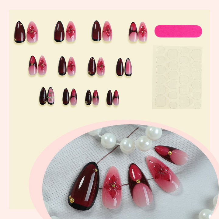 Artificial nail set with elegant flower and glitter decorations Bowlift