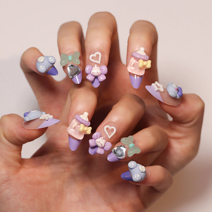 Artificial nail art with playful designs Bowlift