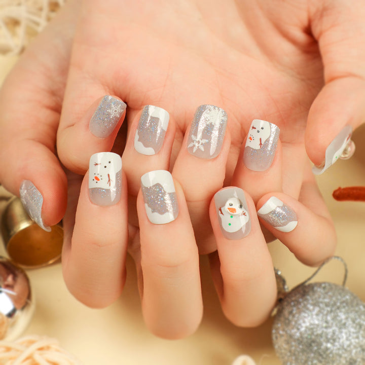 Artful Nail Art with Snow and Christmas Motifs Bowlift