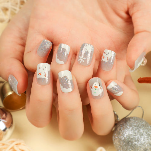 Artful Nail Art with Snow and Christmas Motifs Bowlift