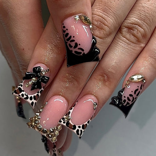 Artful Nail Art with Rhinestones and Animal Accents Bowlift