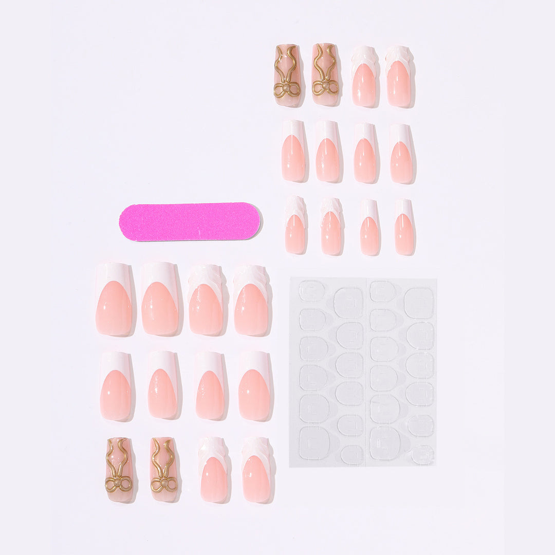 Artificial nail set with luxurious golden accents and elegant design Bowlift