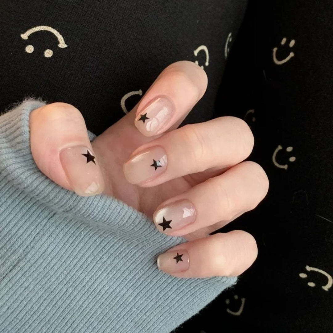 Artistic Press-On Nail Set with Star Designs Bowlift