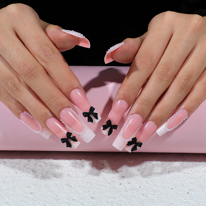 Artificial nail set with elegant rhinestone and bow decorations Bowlift