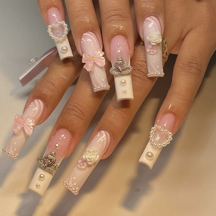Creative acrylic nail set with delicate pearl and gloss accents Bowlift