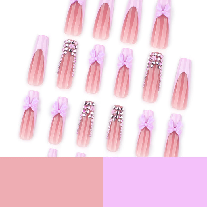 Artful Nail Art with Rhinestone Accents and Bows Bowlift