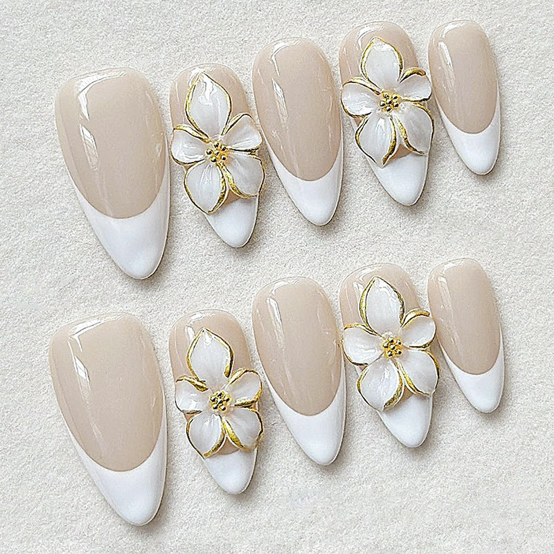 Artificial nail set with elegant flowers and glitter decorations Bowlift