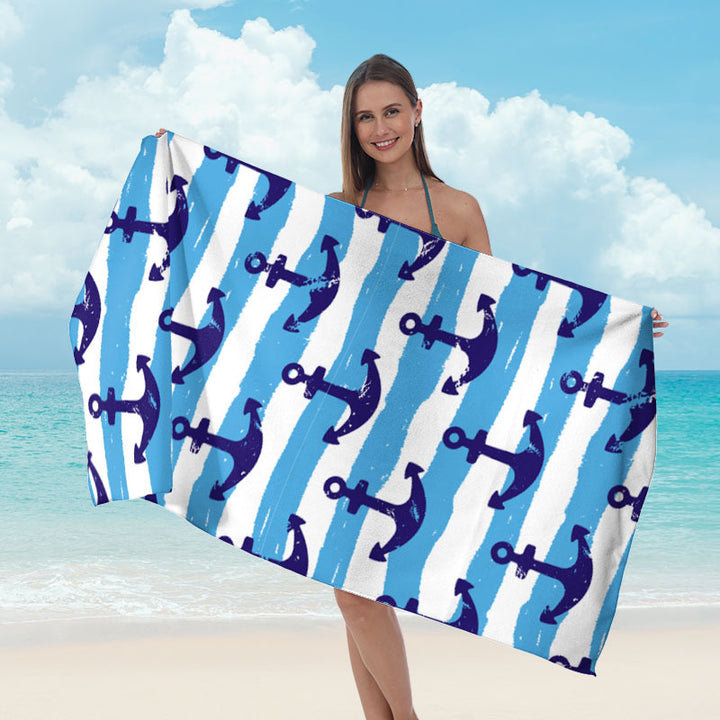 Beach towel with tropical leaf design Bowlift