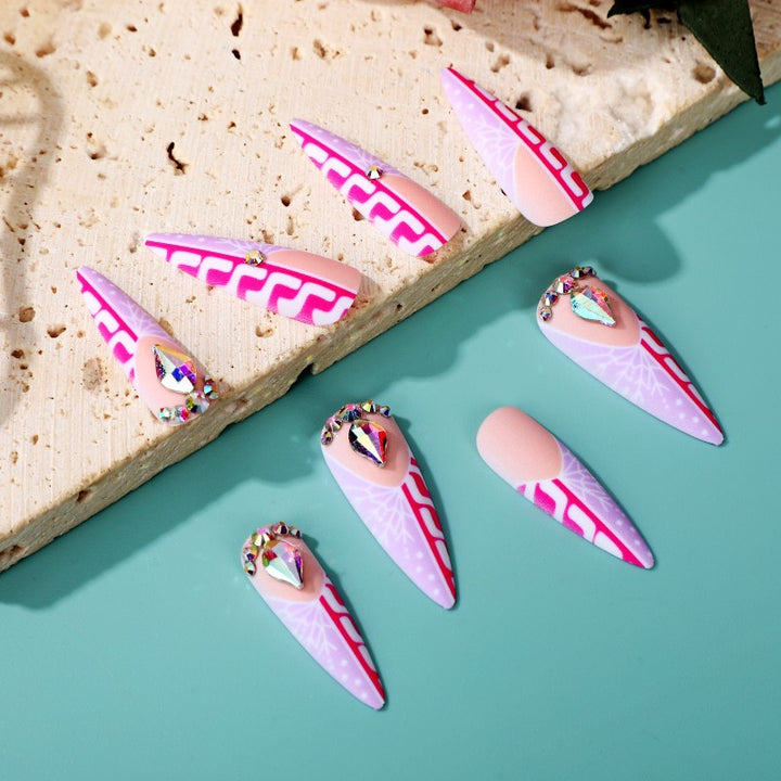 Creative Stiletto Art Nails with Geometric Patterns Bowlift
