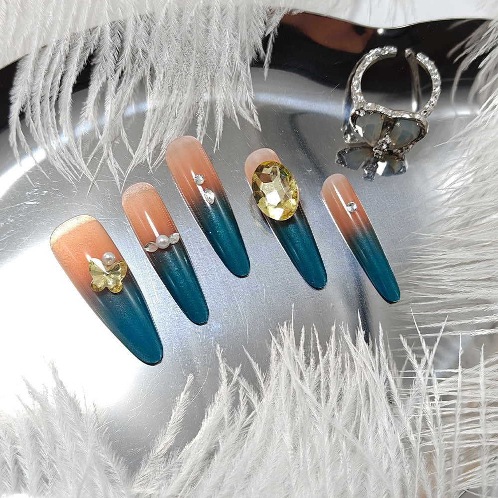 Glamorous artificial nails with elegant ombre effect and high-quality embellishments Bowlift