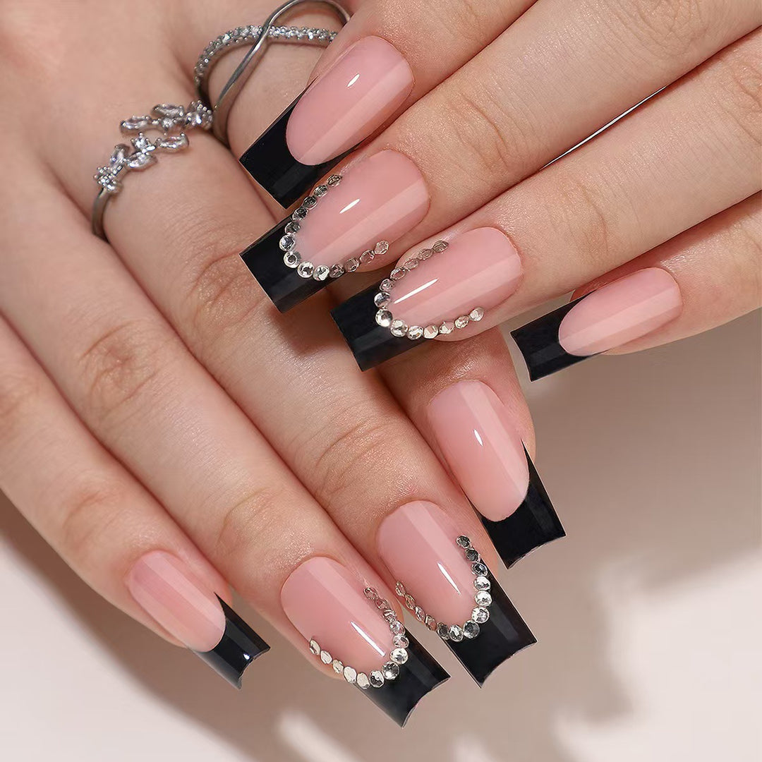 Artificial nail set with elegant tips and glitter accents Bowlift