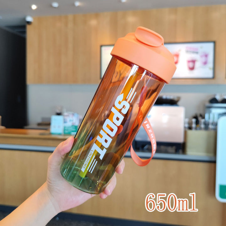 Women's sports water bottle with practical straw and carry function Bowlift