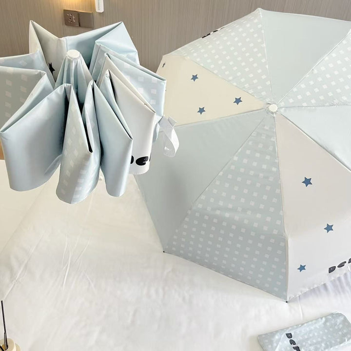Women's folding umbrella with unique star pattern and practical carrying bag Bowlift