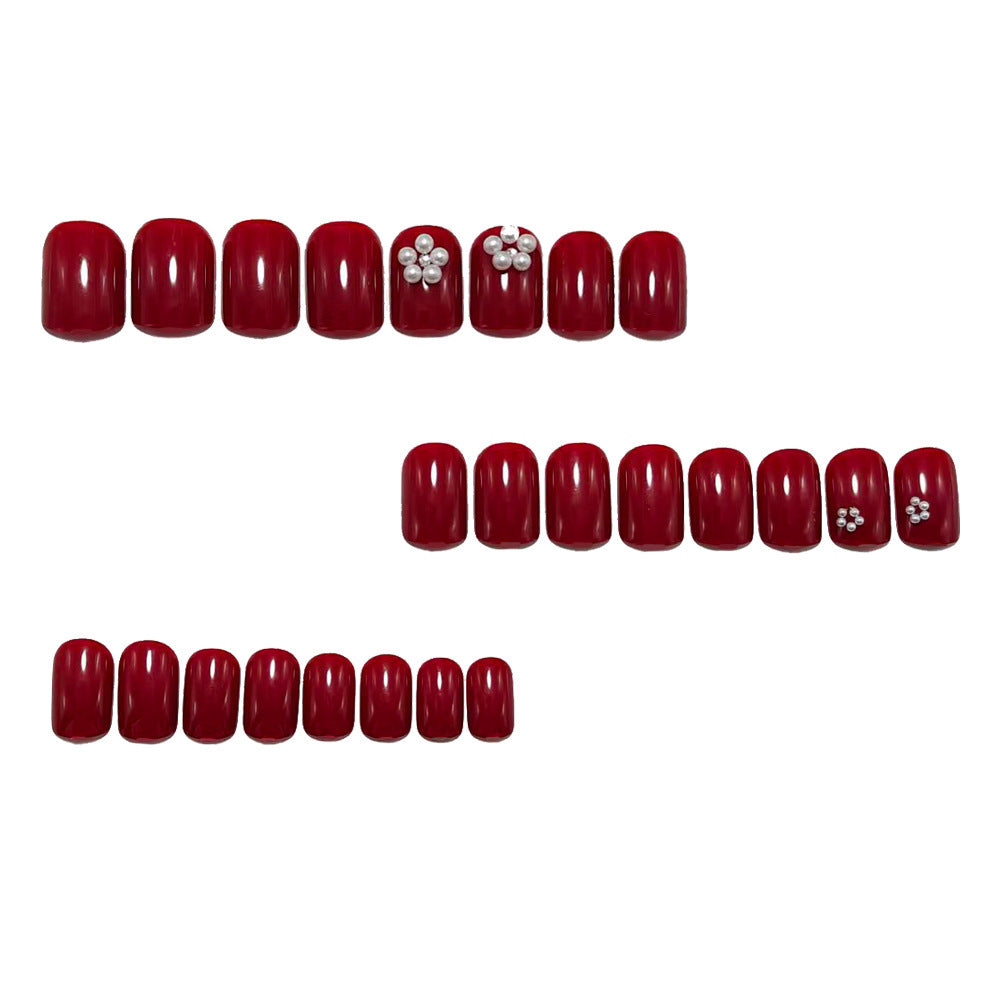 Elegant artificial nails with shimmering rhinestone embellishments Bowlift