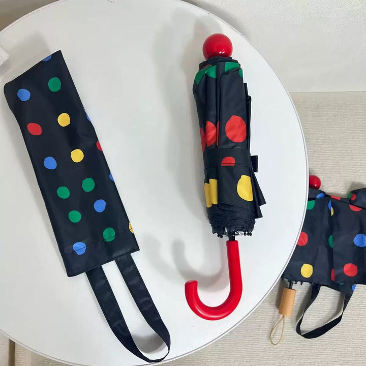 Ladies designer foldable umbrella with colorful polka dot pattern Bowlift
