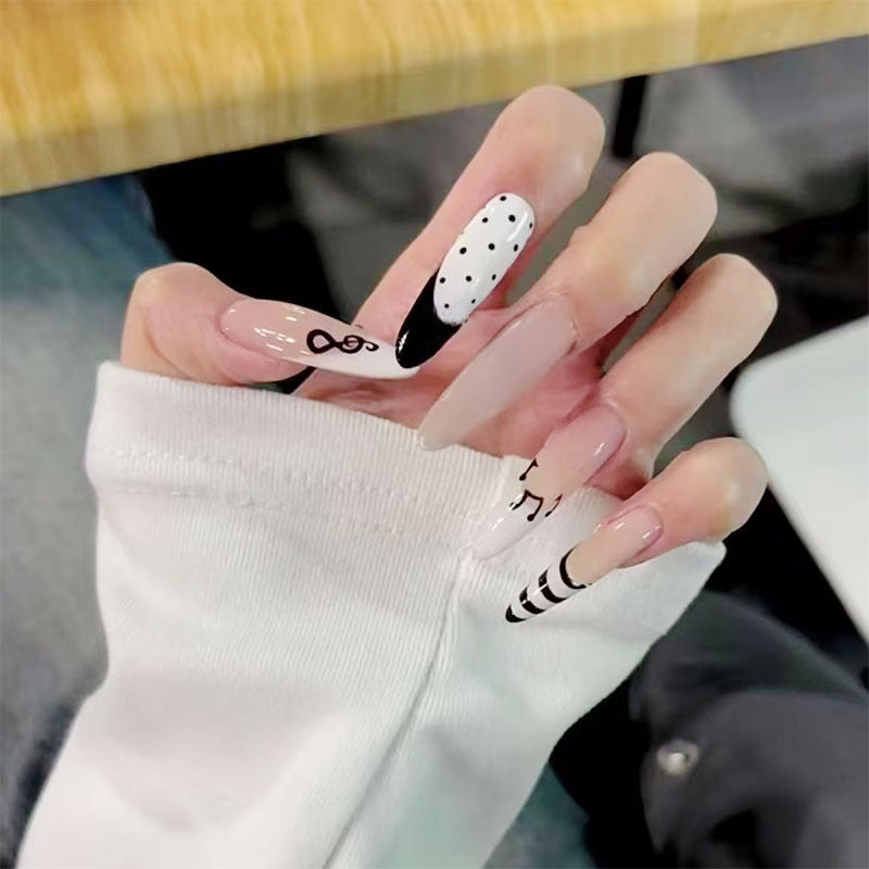 Artistic Long Stiletto Nail Enhancements Bowlift