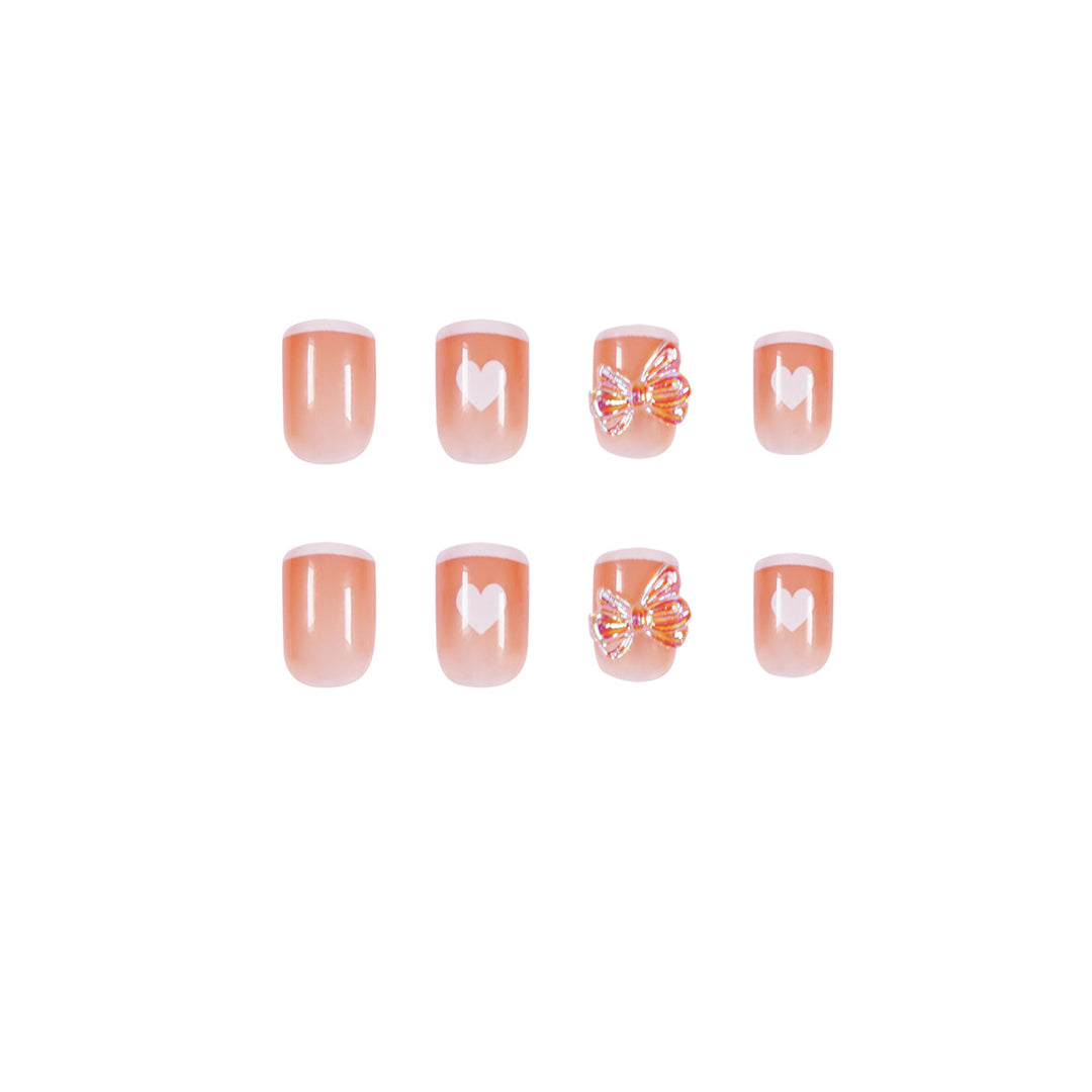 Nail art with heart and butterfly motifs Bowlift