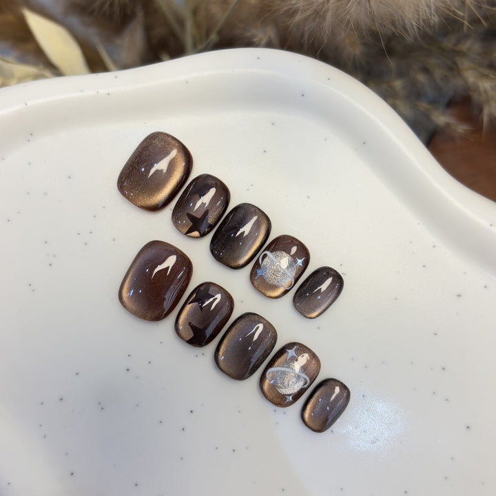 Artificial nail set with star and planet design Bowlift
