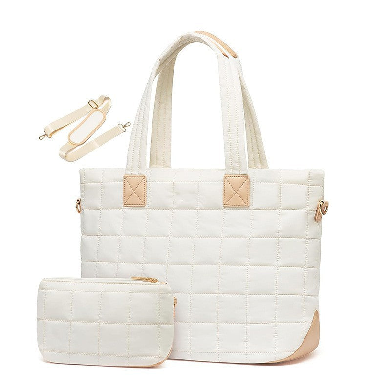 Fashionable quilted tote bag with removable cosmetic pouch Bowlift