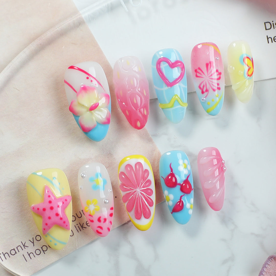 Creative nail art set with playful floral design and glitter effects Bowlift