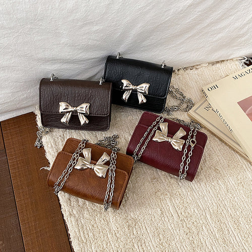 WoCharming Bow-Embellished Mini Handbag Bowlift