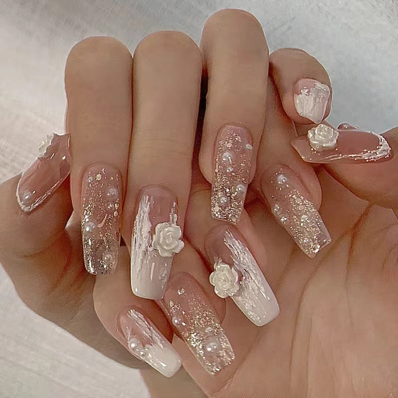 Elegant artificial nails with glitter and flower decoration Bowlift