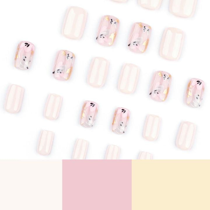 Elegant Artificial Nail Design with Floral Accents Bowlift