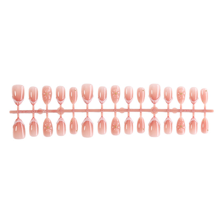 Decorative Press-On Nail Set with Floral Accents Bowlift 1788495814