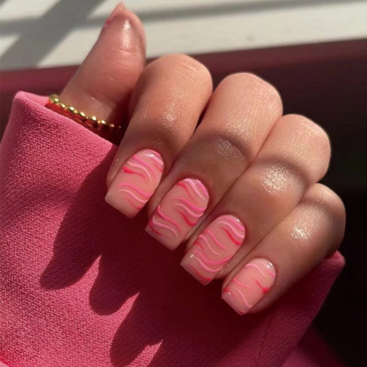 Artful Gel Nails with Elegant Wave Pattern Bowlift