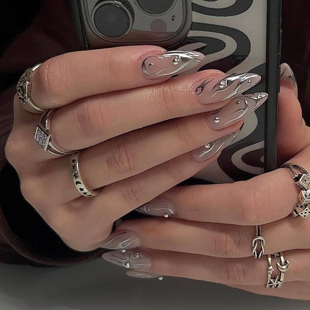 Nail set with elegant water drop design and 3D accents Bowlift