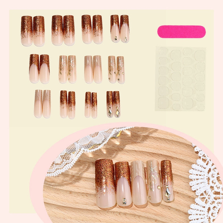 Glamorous artificial nail set with glitter and elegant embellishments Bowlift