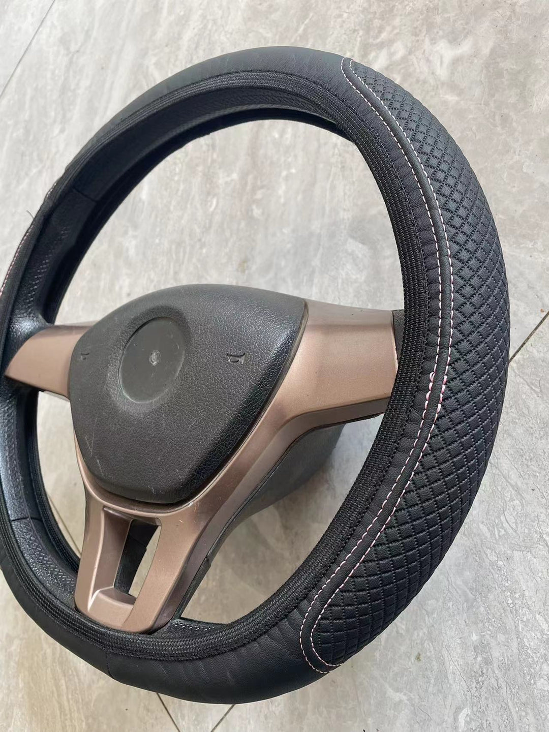 Premium padded steering wheel cover with anti-slip textured grip Bowlift