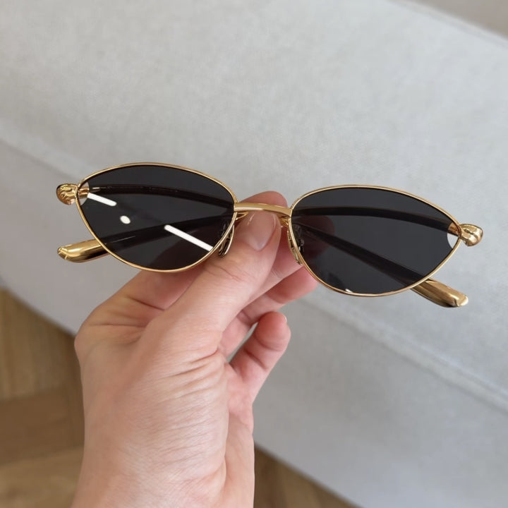 Women's designer sunglasses with elegant metal frame and protective lenses Bowlift