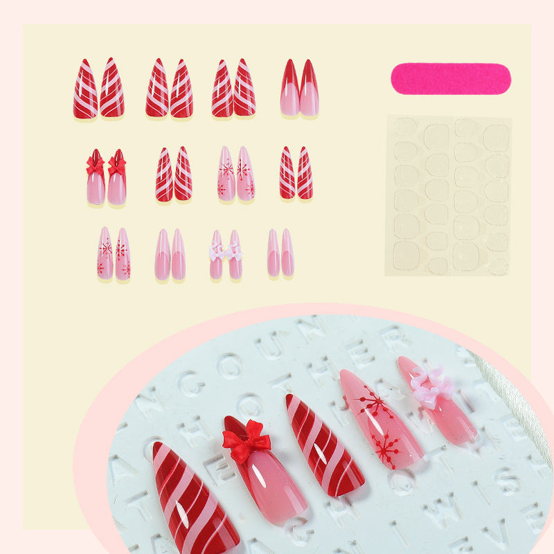 Creative nail art set with festive motifs and embellished accents Bowlift