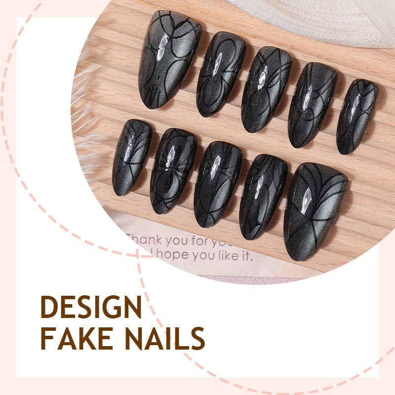 Acrylic nail set with creepy spider design and glitter accents Bowlift