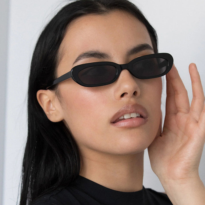 Women's trendy cat-eye sunglasses with transparent plastic frame and UV protection Bowlift