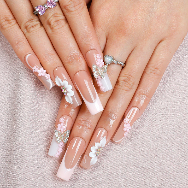 Artificial nail set with floral and extravagant 3D decorations Bowlift